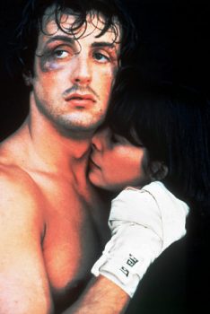 ** HOLD FOR RELEASE UNTIL 11 PM EDT -- FILE ** In this 1976 file photo, actor Sylvester Stallone holds actress Talia Shire in a scene from the classic film "Rocky." The film was ranked fourth on the American Film Institute's list of inspirational films revealed Wednesday, June 14, 2006, during its annual top-100 films television special. (AP Photo) Original Filename: FILM_AFI_INSPIRING_MOVIES_LA103.jpg